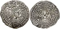 A Turk Shahis ruler named Sandan, otherwise unknown. Copy of a late issue of Khusrau II, combining Brahmi script around the ruler, Bactrian script along the two rims, where "ςανδανο βαγο χοαδηο" "Lord King Sandan" is mentioned, and Pahlavi around the altar on the reverse.[115][116]