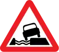Water course alongside road