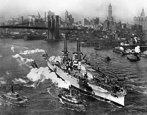 Hyperboloid mast towers were on the USS&nbsp;Arizona, a view from the Manhattan Bridge on the East River, in New York City, December 25, 1916.