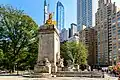 The USS Maine National Monument at the Merchant's Gate entrance to Central Park