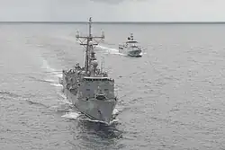 USS Rodney M. Davis alongside KDB Darulaman during CARAT 2014.