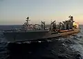 John Lenthall steams alongside the destroyer Bulkeley