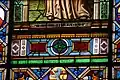 Ulisse De Matteis, detail showing place and date, stained glass window in the apse of Santa Trinita, Florence. 1897.