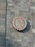 University logo on the south gate