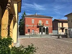 The former town hall, now used as a post office, medical clinic and local headquarters of the National Alpini Association