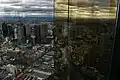 Looking north-east over Melbourne CBD from the observation deck, with reflections in the tower's gold plated windows