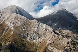 A mountain range with steep cliffs and peaks