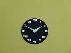 Mural clock in the young man chamber