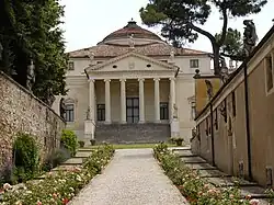 Service corridor leading up to building façade