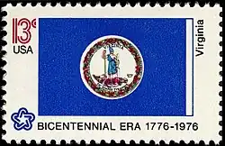 The Virginia state flag as depicted in the 1976 postage stamp commemorating the U.S. bicentennial, including silver fringe on the fly.