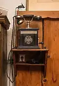 Image 3Historical telephone with the German imperial eagle and the heraldic shield of the House of Hohenzollern dynasty; Vollmer's Mill, Seebach, Baden-Württemberg, Germany