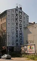 Change Your Frequency mural on a building in Kreuzberg