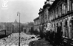 Damaged façade in 1944, before partial demolition