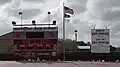 Fighting Wildcats Stadium scoreboard and championship billboard