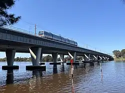 Concrete bridge crossing a river