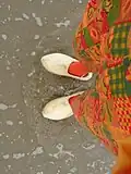 Clogs of the North Sea coasts in surf; they are waterproof.
