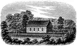 A drawing of a brick, gable roof church with a graveyard to the right and surrounding fencing and trees