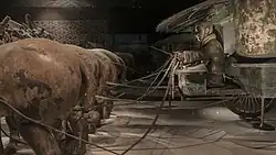 Kneeling charioteer