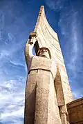 Side view of the Red Army soldier holding a victory banner