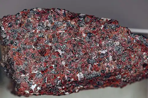 Zinc ore from the mine. red = zincite, black = franklinite, white = calcite.