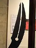 Closeup of the saw-toothed and notched point of the 19th-century Indian-made "Zulfiqar" sword kept in the Higgins Collection (accession no. 2240); circa 1800