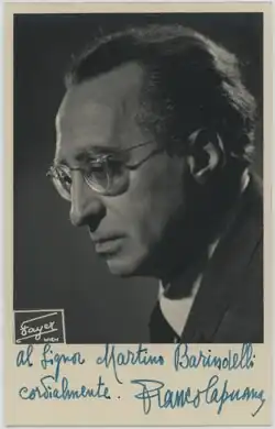 A black and white photograph of a man