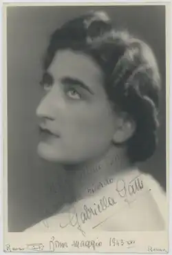 A black and white photograph of a woman
