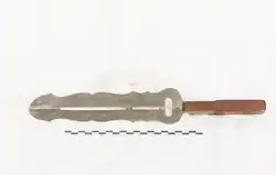Metalic feuerzange, with wooden handle.