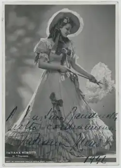 A black and white photograph of a woman