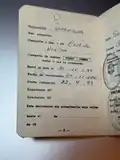 Older Argentine burgundy Foreigner's Identity card, where data and pages were different.