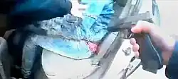 Body camera image of Kim Potter holding a gun during the arrest of Daunte Wright