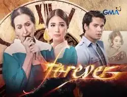 An image of Gloria Romero, Heart Evangelista, Geoff Eigenmann and a drawing of a woman. The series title is displayed on the lower right side of the image. The logo of GMA Network is displayed on the upper right side of the image.