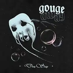 A grainy graphic of a hand reaching out of murky and bubbly fluid to grasp a white drama mask