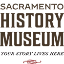 Brown text with the museum's name