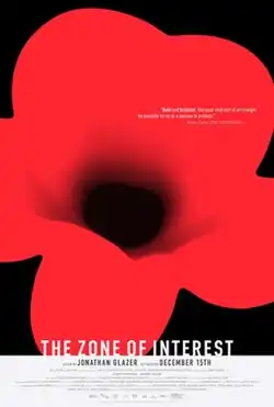 A red flower with a pitch black center.